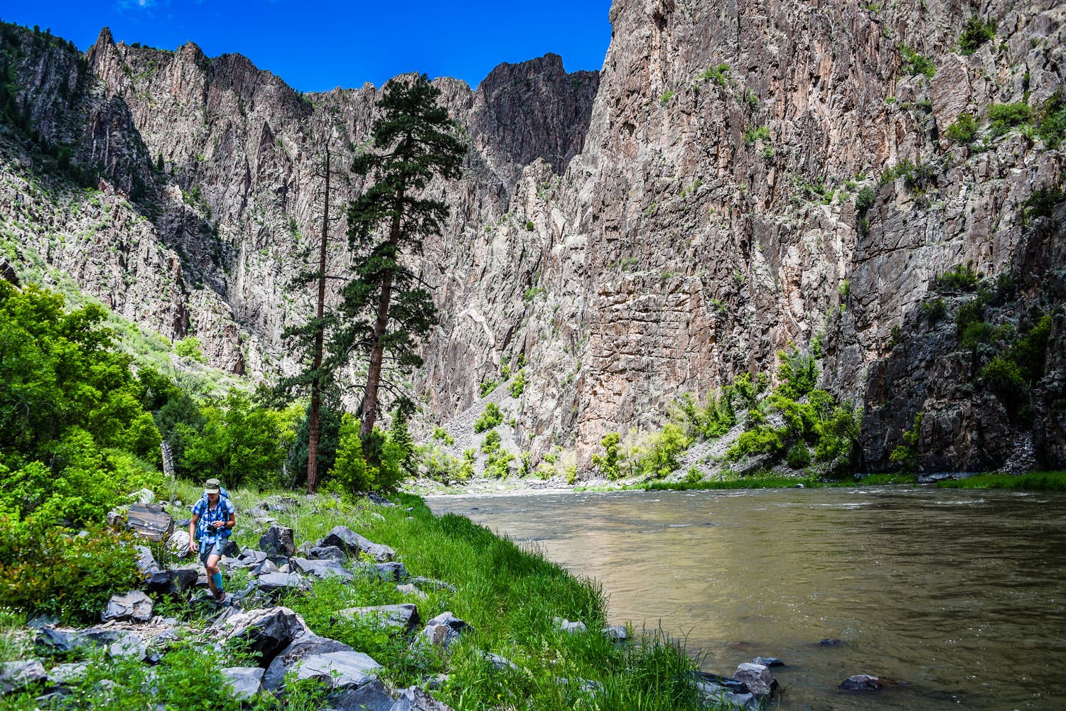 Hiker on the Gunnison Route Trail