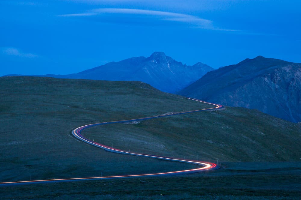 RM-Trail-Ridge-lights_Ordelheide_1000 Car lights illuminate Trail Ridge Road at night in Rocky Mountain National Park