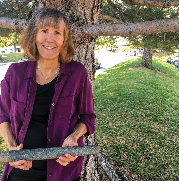 Marilyn Martorano with one of the stones discovered in Great Sand Dunes National Park & Preserve
