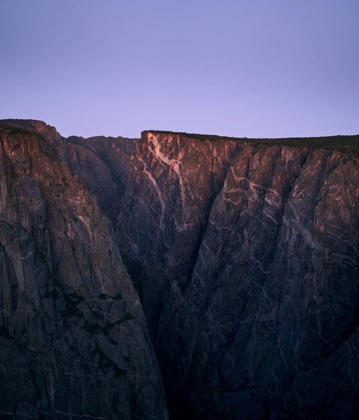 BlkCanyon-PaintedWall-PreDawnGlow_Tam19MitchWarnick_700v Pre dawn at the Painted Wall in Black Canyon of the Gunnison National Park