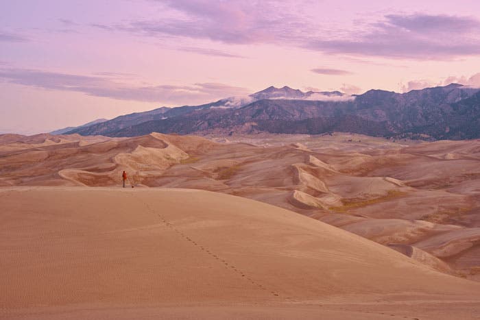 Dawn hiker at Great Sand Dunes National Park