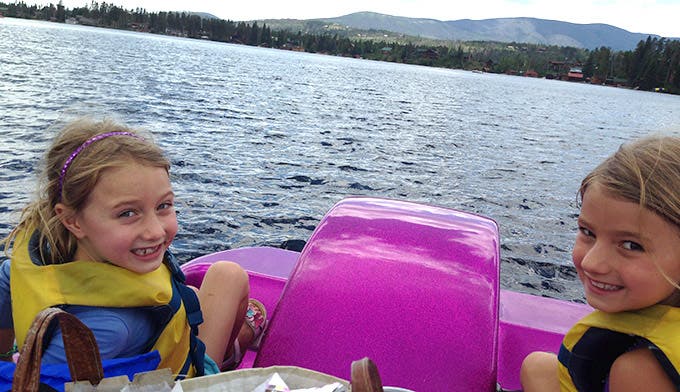Kids boating in Grand Lake, Colo.