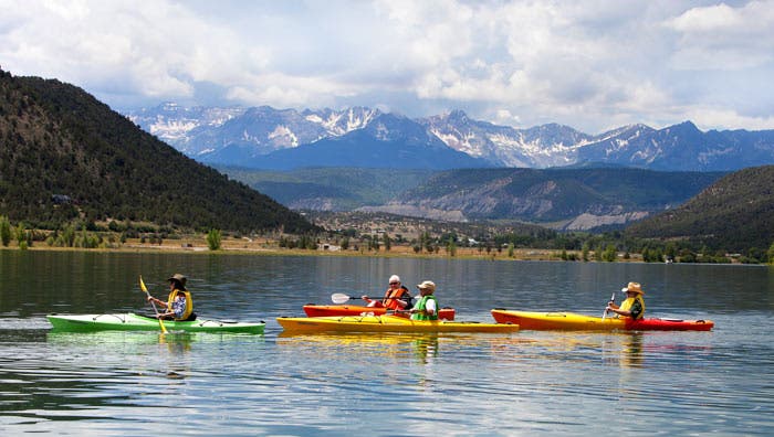 COStateParks-Ridgway-kayaks_KenPapaleo_courtesy_700 Kayaking in the lake at Ridgway State Park in Colorado