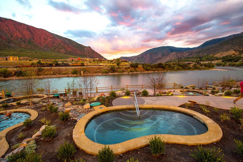 Sunset on the river at Iron Mountain Hot Springs in Glenwood Springs, Colo.