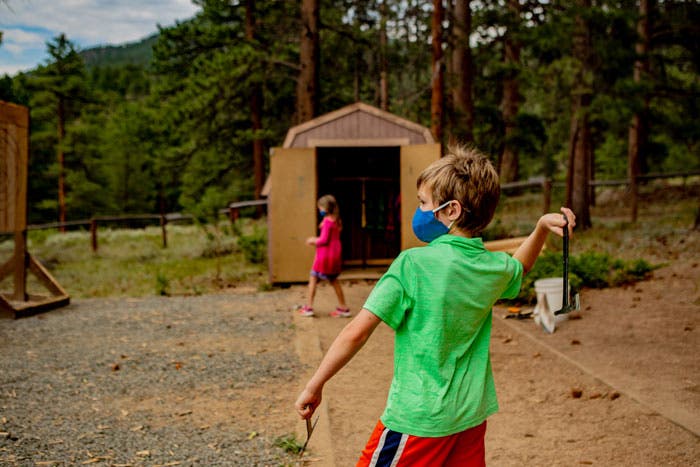 Kids do Axe Throwing at the Estes Park YMCA location