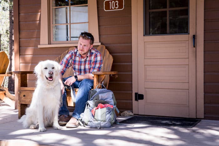 Stay at a YMCA cabin or lodge room; some are pet-friendly.