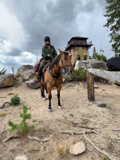 Darla Sidles on horseback at Shadow Mountain Lookout in Rocky Mountain National Park