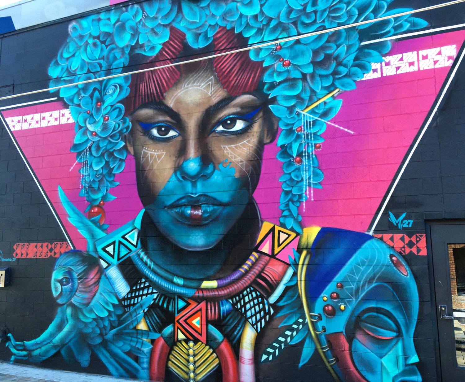 Blue and pink portrait mural, River North Arts District, Denver